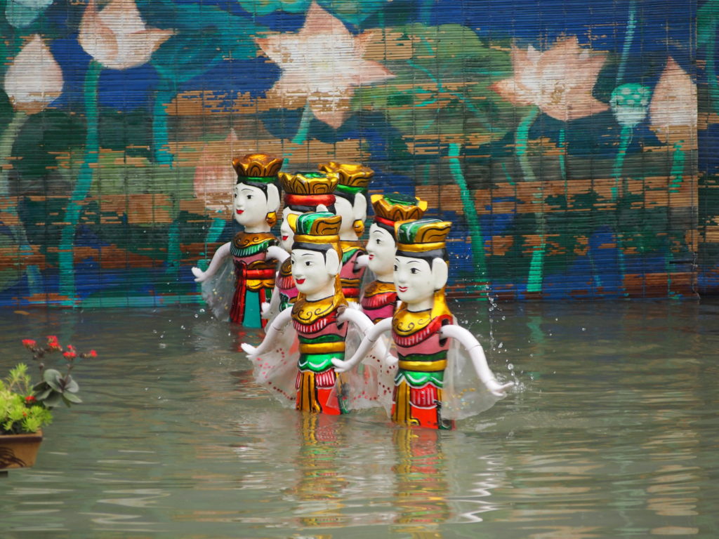 Vietnamese water puppets in mid-performance. Image courtesy of chriskay / Creative Commons.