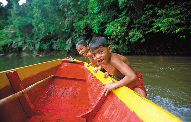 Kids in river along Ulu Temburong. Image courtesy of Brunei Tourism