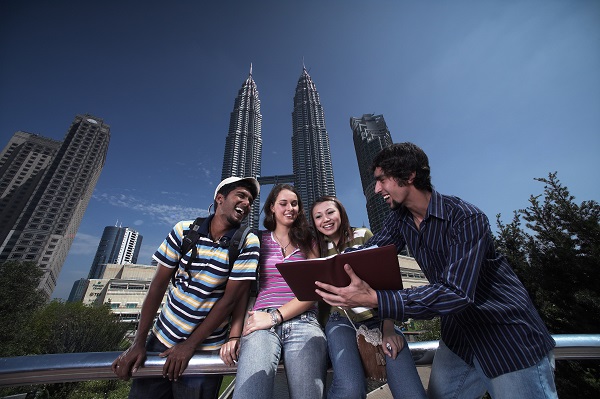 Visitors in front of Petronas Twin Towers. Image courtesy of Tourism Malaysia.