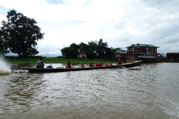 Boat entering Inle Lake village, Myanmar
