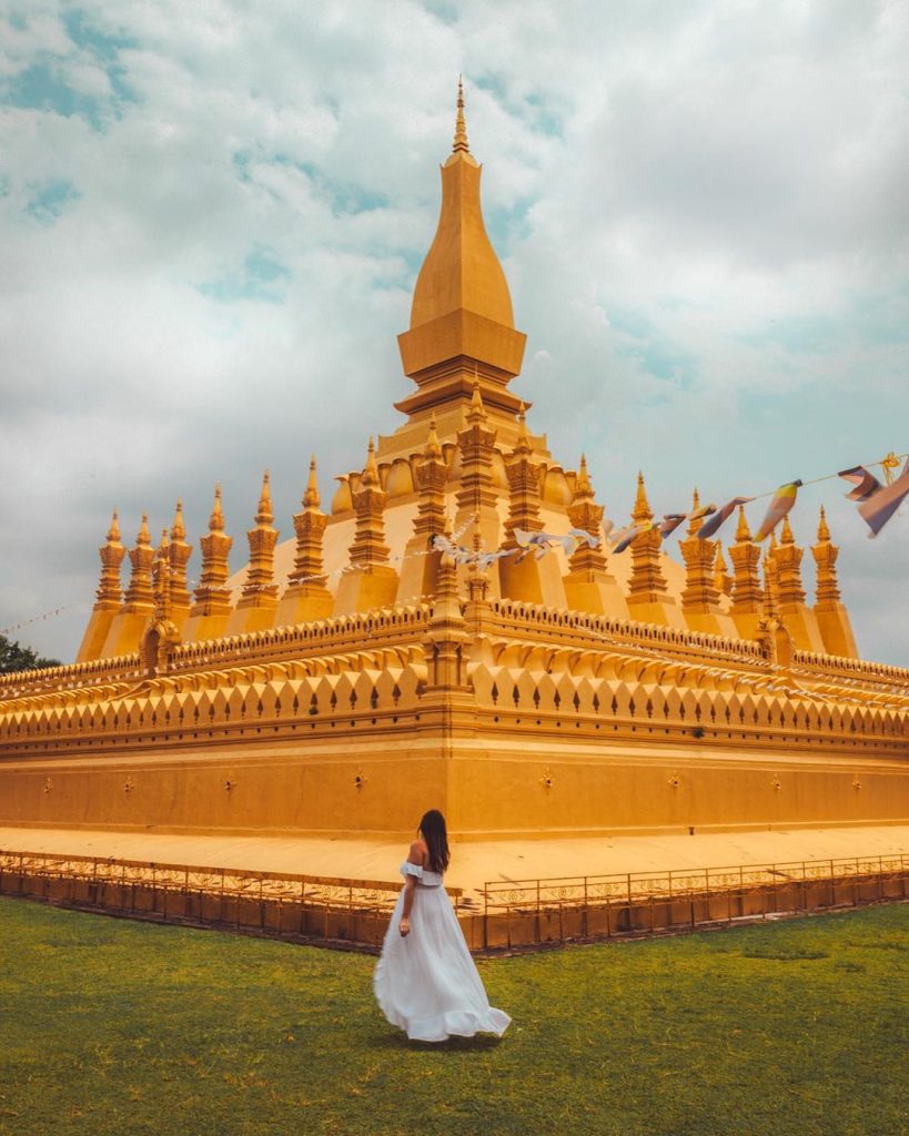 The main stupa of Pha That Luang is about 150 feet tall and stands protected by 30 smaller stupas surrounding its base.